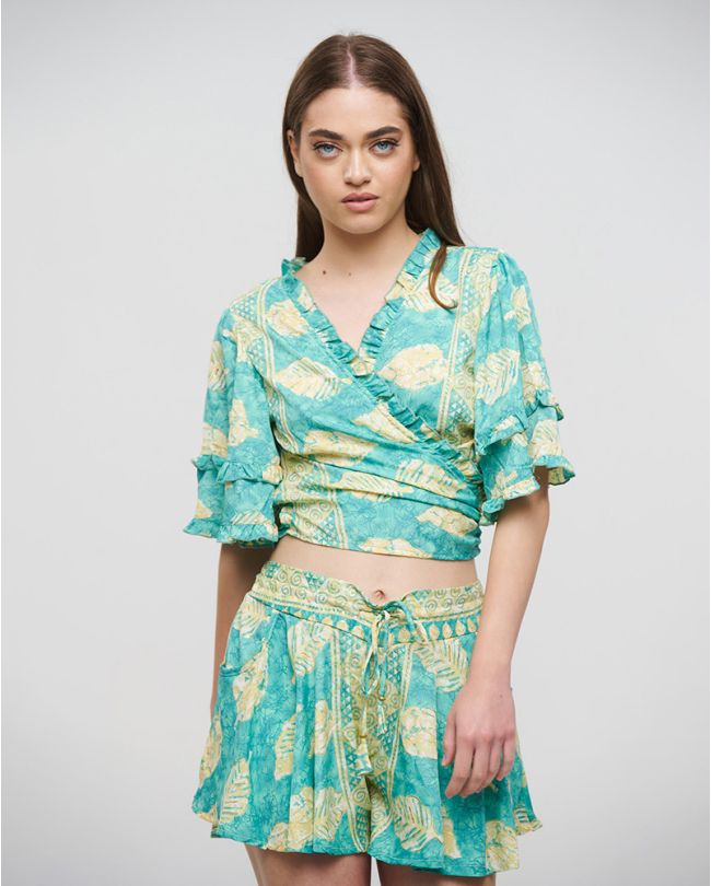 CROP TOP WITH KNOT IN TURQUOISE/GREEN COLOR WITH LEAVES AND GOLD DETAILS ONE SIZE(100% CREPE)