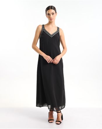 ΦΟΡΕΜΑ ΜΑΚΡΥ ΑΜΑΝΙΚΟ ΜΕ ΑΝΟΙΧΤΗ ΠΛΑΤΗ ΣΕ ΜΑΥΡΟ ΧΡΩΜΑ ΜΕ ΑΣΗΜΙ ΛΕΠΤΟΜΕΡΕΙΕΣ ONE SIZE (100% POLY GEORGET WITH POLY LINING)